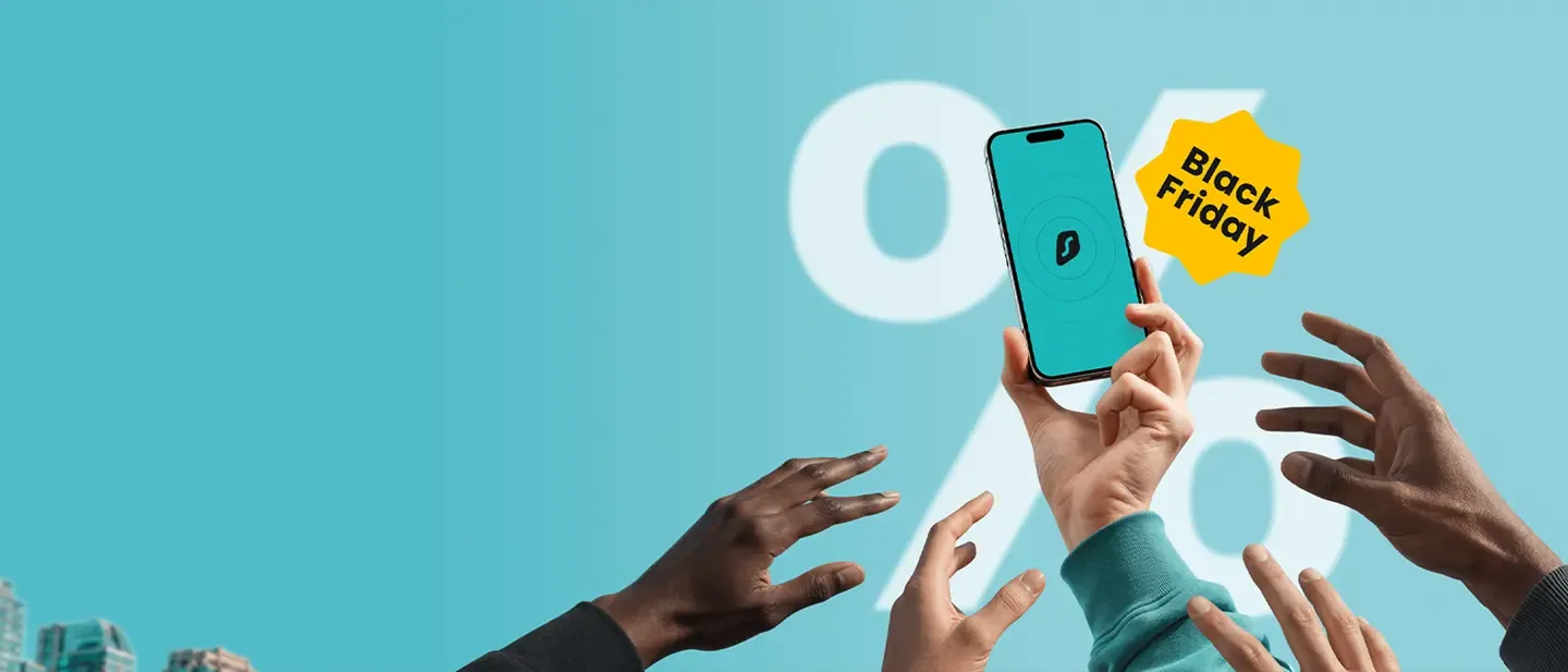 Hands reaching toward a phone with the Surfshark app and a Black Friday badge.
